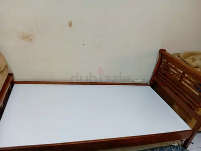 Solid wood single bed frame with headboard and slatted footboard