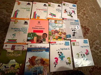Collection of Primary School Textbooks and Workbooks (English, Arabic, Science) - Lot