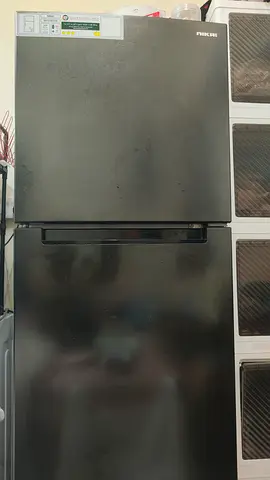 Black two-door refrigerator in good working condition