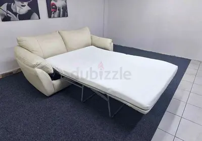 Comfortable Cream Faux Leather Sofa Bed