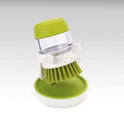 Dishwashing brush with soap dispenser and drip tray - green