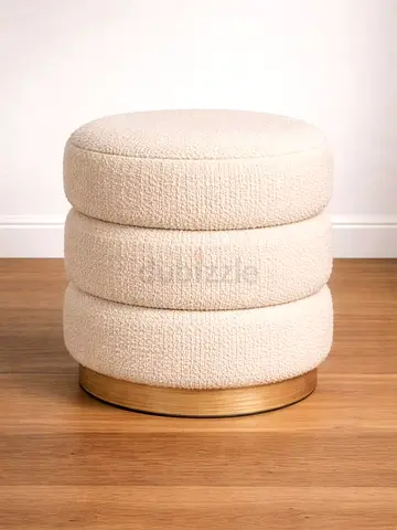 Cream boucle round ottoman stool with brass base