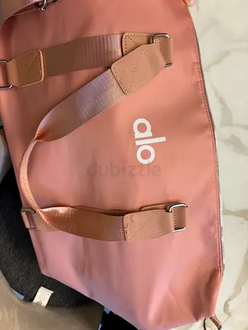 ALO Yoga pink duffle gym bag and adjustable strap light