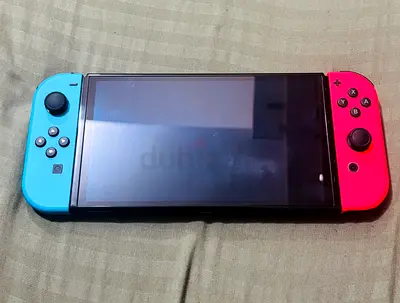 Nintendo Switch console with Neon Blue/Red Joy‑Cons - used
