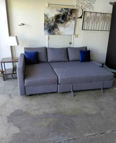 Gray Fabric L-Shaped Sofa Bed with Storage - Good Condition