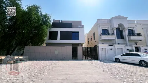 Villa for sale in Ajman, Al Helio area. 5 master bedrooms with roof terrace, private pool, majlis,