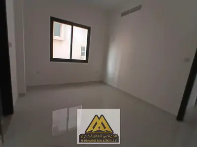 A spacious 2-bedroom apartment with a living room is available for annual rent in Al Rumailah 1, Aj