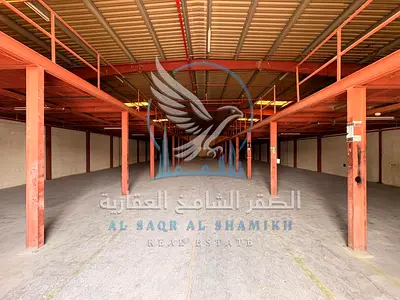 مستودع للإيجار | المنطقة الصناعية 11، الشارقة. المساحة الإجمالية: 8,000 قدم مربع (الطابق الأرضي: 5,000 قدم مربع، الميزانين: 3,000 قدم مربع). الاستخدام