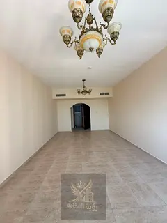 For rent in Al Taawun Sharjah 2 bedrooms and living room 3 bathrooms free maintenance air conditioni