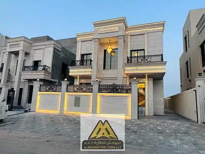 فرصة استثمارية وسكنية فاخرة للبيع شاملة رسوم التسجيل: فيلا كلاسيك فخمة بواجهة حجر بالكامل (G+1+R) تتكون من 6 غرف نوم ماستر ورووف في الحليو 1 بعجمان –