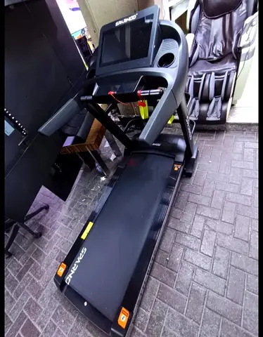 The Sparnod Fitness STH-6010 Treadmill is a high-performance motorized home-use running machine feat