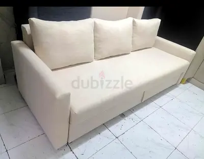 Cream 3-seater Sofa bed with Removable Cushions - Good Condition