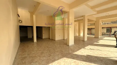 محل تجاري للإيجار على شارع جمال عبد الناصر | 2400 قدم² | مقابل حديقة المجاز