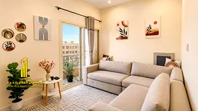 Luxury apartment, second occupancy, one bedroom and living room with a balcony and open view. Ajman,