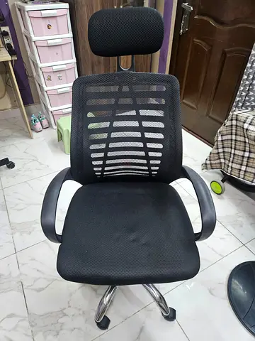 Ergonomic black mesh office chair with headrest - excellent condition