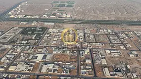 An industrial land in the Al Bataeh area, in a prime location, entrance from Al Dhaid Road, owned by