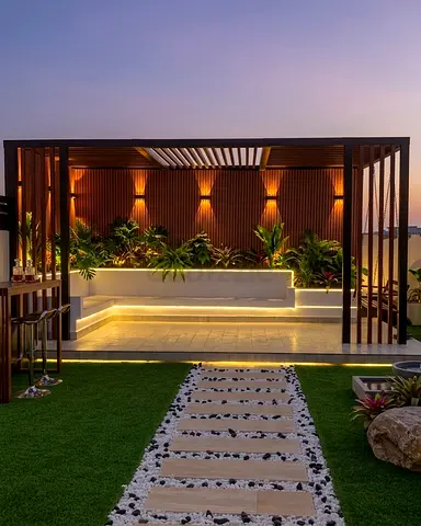 Outdoor pergola seating with integrated planters and ambient LED lighting