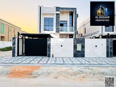 Villa at a bargain price in the most prestigious area of ​​Al Muwaihat, corner lot, with easy bank