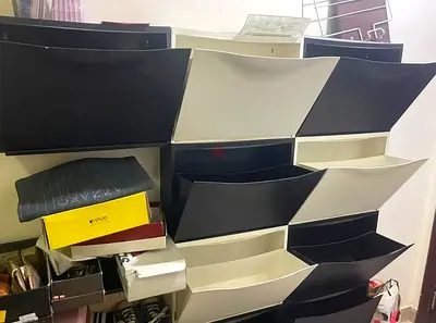 Wall-mounted modular shoe storage unit — black & white, good condition