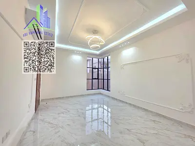 Brand-new villa, first tenant, in Al Yasmeen, with 5 master bedrooms, built-in wardrobes, majlis, living room, maid’s room, ACs and covered parking.