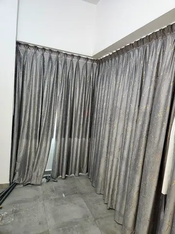 Grey Curtains with Gold Accent Design