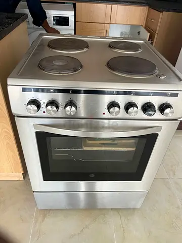 Used freestanding electric cooker with 4 hotplates and oven - stainless steel