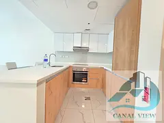 Duplex Furnished 2BR with Canal View with Shared Pool GYM in Raha Lofts1