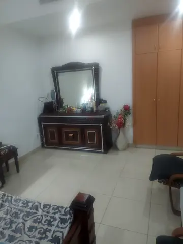 Wooden dresser with mirror and matching wardrobe - good condition. urgent sale