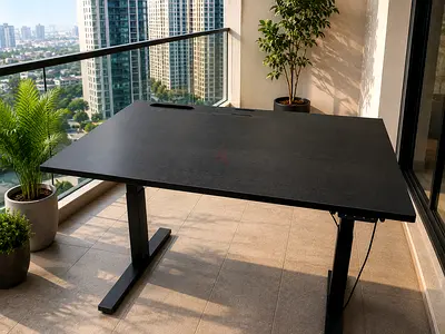 Electric height-adjustable standing desk — sturdy black finish, good condition