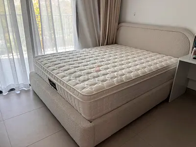 Beige upholstered boucle bed frame with mattress - excellent condition