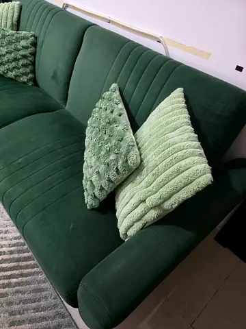 Green velvet 3-seater sofa in good condition