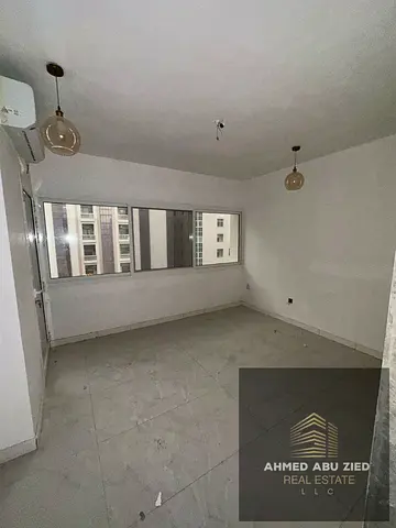 3BR hall apartment in Al Majaz 2 on Jamal Abdul Nasser Street; fully renovated building, large hall