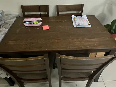 Solid wood dining table with 4 chairs - used, good condition