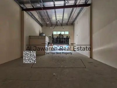 Warehouse for rent, 2,015 sq. ft., located on a main street; features 25 kW power, an office, and a bathroom.