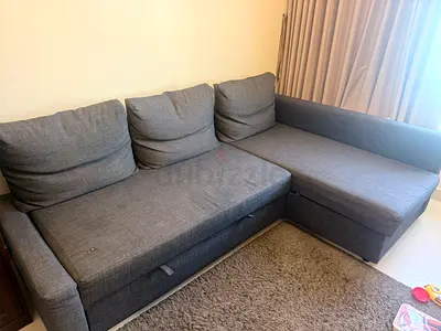 IKEA L shaped grey sofa with storage