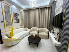 Luxury apartment, second occupancy, one bedroom and living room with an open view. Ajman Garden City