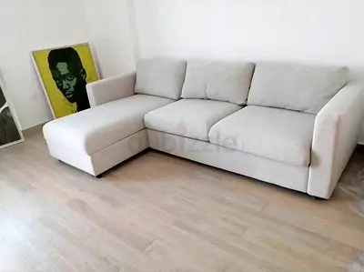 Light grey L-shaped 3-seater sofa with chaise - good condition