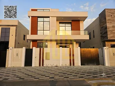 The best opportunity to buy a villa in Ajman with top-quality finishes at the best price. 5 master bedrooms, a majlis, and 2 living rooms.