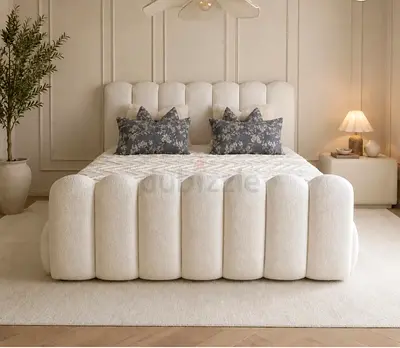 Beige Upholstered Queen Bed with Padded Headboard and Footboard