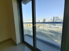 2 Bedroom Apartment | Remal Tower JVC | Balcony & Downtown View
