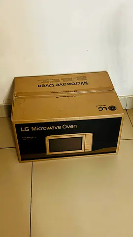 LG Microwave Oven (Brand New in Box) Excellent condition New