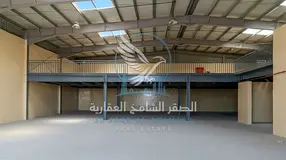 warehouse in Al Sajaa with G+M layout, 44 kW 3-phase power, concrete flooring, kitchen, bathrooms, 1
