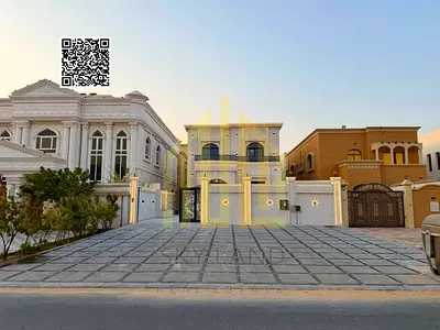 Modern villa in a good location, including air conditioning, water, and electricity, in Al Muwaihat area, directly from the owner, freehold.