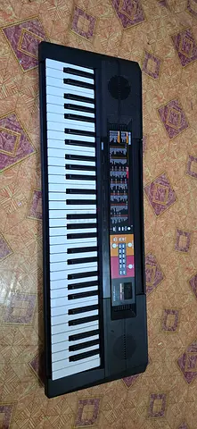 Yamaha-style 61-Key Electronic Keyboard - Good Working Condition