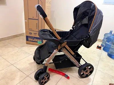 Lightweight grey and gold baby stroller — good condition ( 3 month old very very less use)