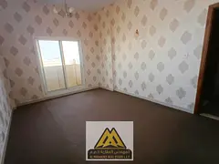 2BR for annual rent in Al Rawda, Ajman, Sheikh Ammar Street, 2 baths, central AC, near services, AED