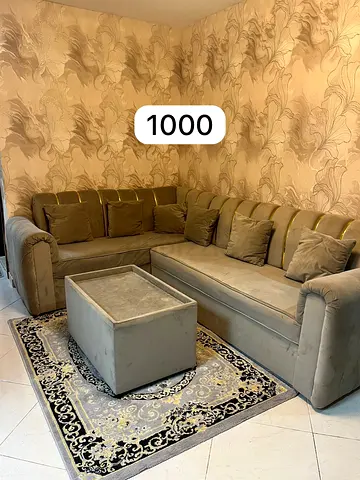 Comfortable L-Shaped Corner Sofa with Matching Ottoman and Cushions