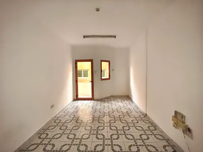 BIG OFFER CHEAPEST RENT 1BHK APARTMENT WITH 2 BATHRO RENT 1BHK APARTMENT WITH 2 BATHROOM split AC Central gas JUST 24K AL QASMIA