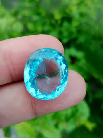 Natural Blue Topaz Oval Faceted Gemstone - 10mm (Approx)