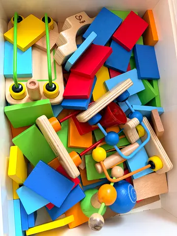 Mixed wooden educational toy set — blocks, bead maze pieces and shapes
